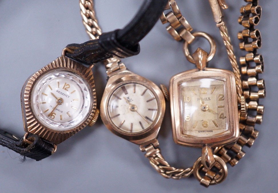 Two lady's 9ct gold manual wind wrist watches, Ebel & Majex, on 9ct bracelets, gross 25.6 grams and a lady's 9ct gold Regency manual wind wrist watch in a leather strap.